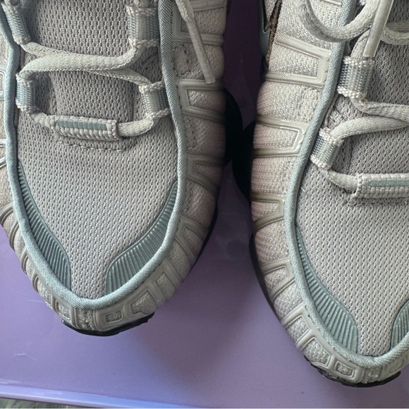 Nike Shox TL- Women's
Running Sneakers in Barboque
Brown and Metallic Silver - Picture 11 of 12